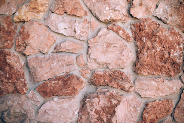 istock The beautiful stoun wall red background outdoors. 1340409171