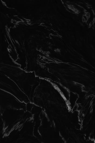 istock Black marble patterned texture background. abstract natural marble black and white for design. 1340419436