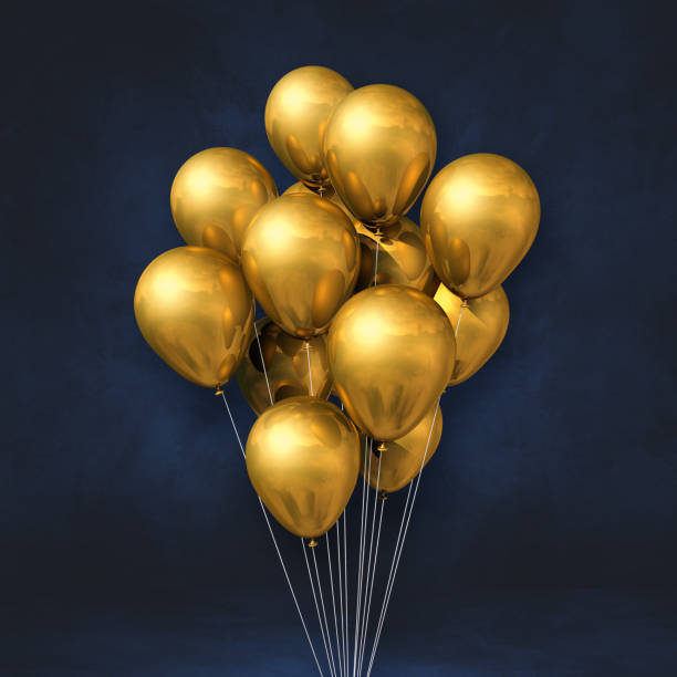 istock Gold balloons bunch on a black wall background 1340424758