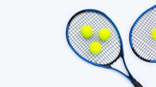 istock Tennis rackets with balls on white. 1340427342
