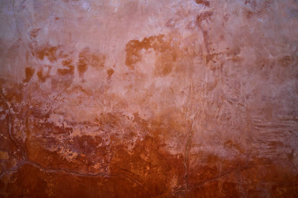 istock Grunge wine brown red wall background 1340427431