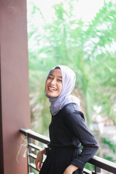 istock Young women hijab relax at park 1340428783