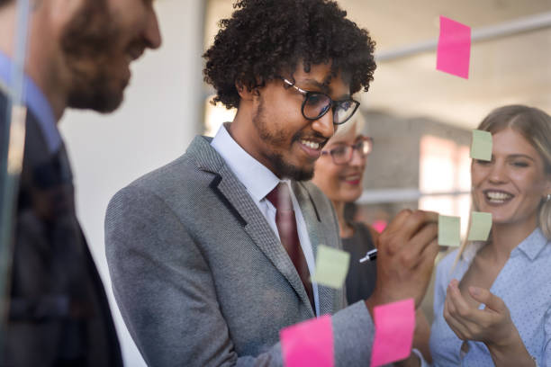 istock Business team working together on meeting, analyzing financial documents in office 1340431159