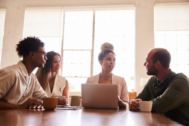 istock Diverse businesspeople talking during a meeting at an office table 1340431167