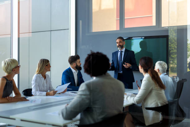 istock Business team working together on meeting, analyzing financial documents in office 1340431186