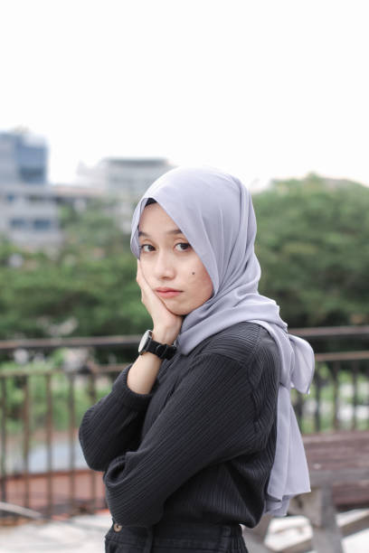 istock Young women hijab at city park 1340432549