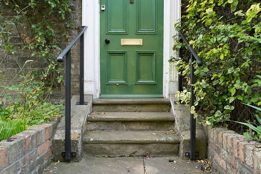Seen in London, the house is a large, victorian terraced house.