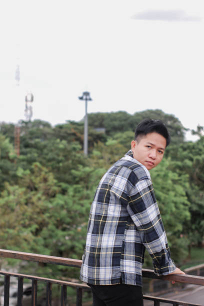 istock young men at city park 1340433913