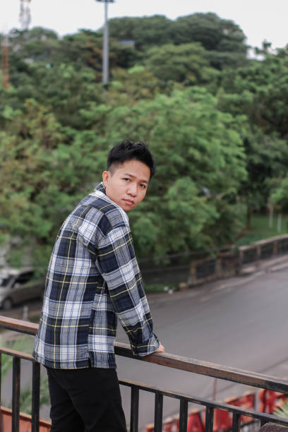 istock young men at city park 1340434596