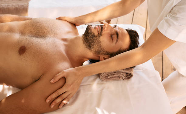 istock Body massage for handsome man. Spa for men, concept 1340435707