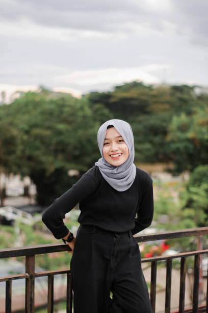 istock young hijab women at city park 1340436314