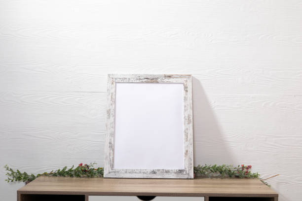 istock Composition of white card in frame with copy space and decorations on white background 1340437084