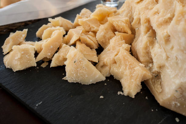istock Sheep cured portuguese cheese over black slate tray 1340439471
