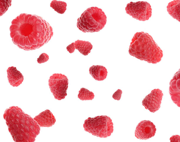 istock Set of falling sweet raspberries on white background 1340440385