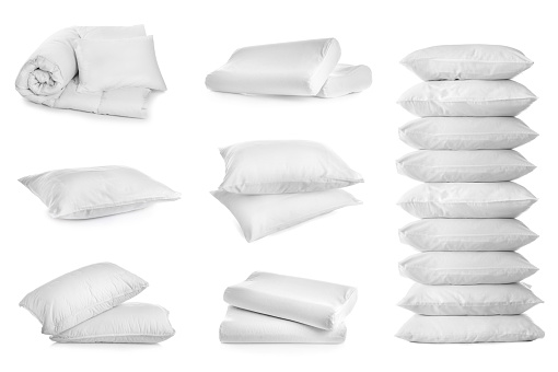 Collage of different soft pillows on white background