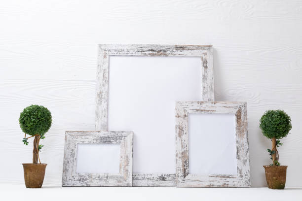 istock Composition of white cards in frames with copy space and tree decorations on white background 1340443929