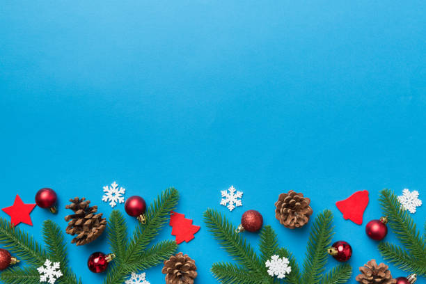 istock Christmas background with fir branches and Christmas decor. Top view, copy space for text 1340443951