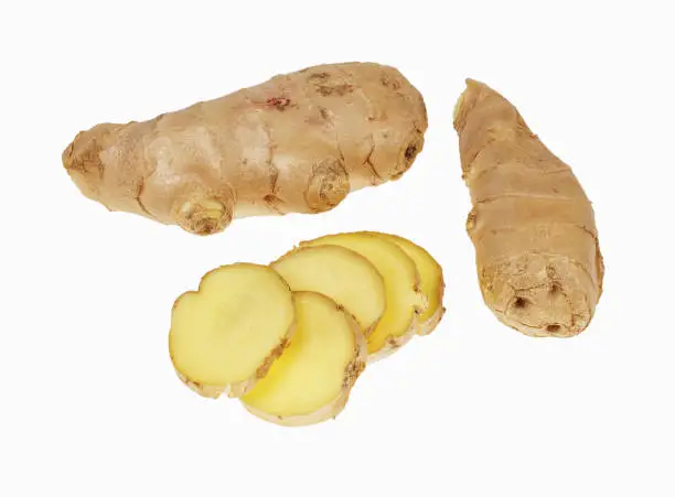 Ginger root and slices of ginger root, isolated on white background