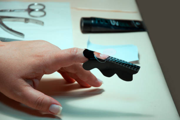 istock nail extension in the salon, manicure, hand care 1340445720