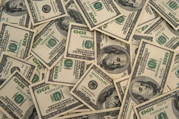 istock business background with us dollar bills, financial concept 1340447770