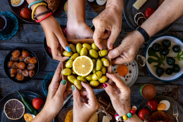istock Close up view of breakfast table with green olives 1340448369