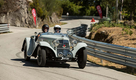 Caramulo, Portugal - 05 September 2021: Two female drivers in a Aston Martin 15-98 short chassis 2 seater of 1939 in Caramulo Motorfestival 2021