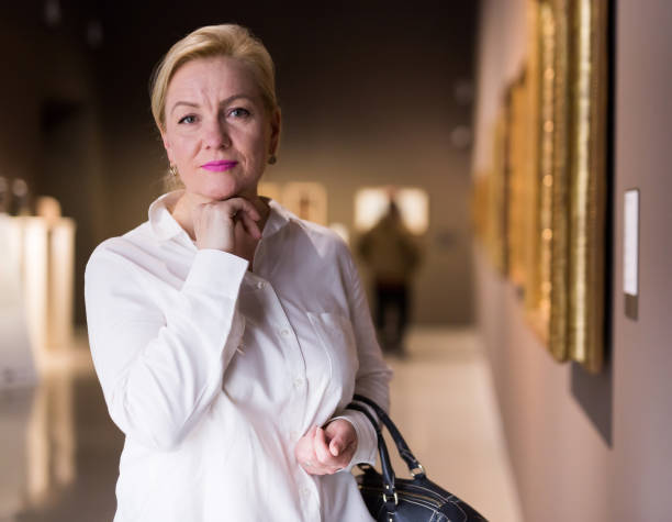 istock Closeup on mature female visiting museum 1340450461