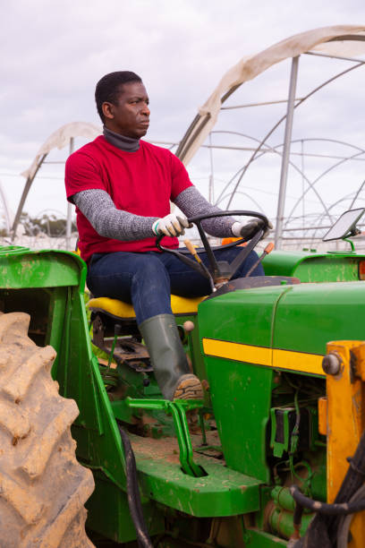 istock African american man working on garden tractor 1340450692