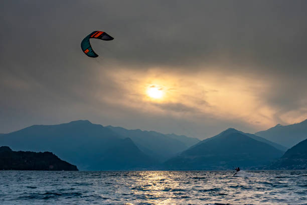 istock Kitesurfing scene at sunset on Lake Como 1340456832