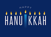 istock Happy Hanukkah lettering on blue background with menorah. Vector. 1340459096