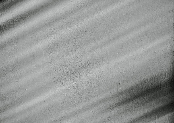istock Abstract background and texture with Graphic geometric shadows on the wall 1340459722