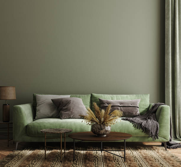 istock Home interior mock-up with green sofa, table and decor in living room 1340460296