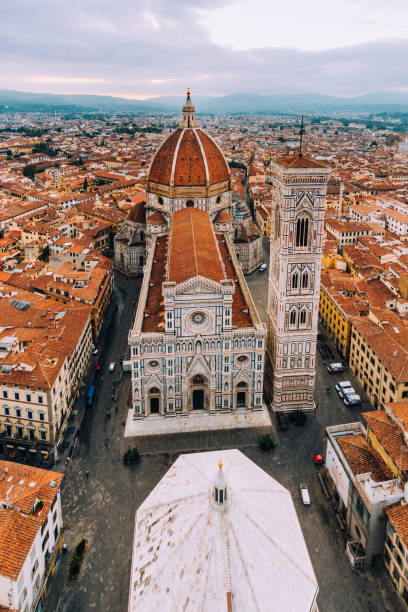 Aerial view of Piazza del Duomo in Florence, Italy Aerial view of Piazza del Duomo in Florence, Italy. Duomo di Santa Maria del Fiore, the famous Cathedral of Florence during sunrise. florence italy stock pictures, royalty-free photos & images