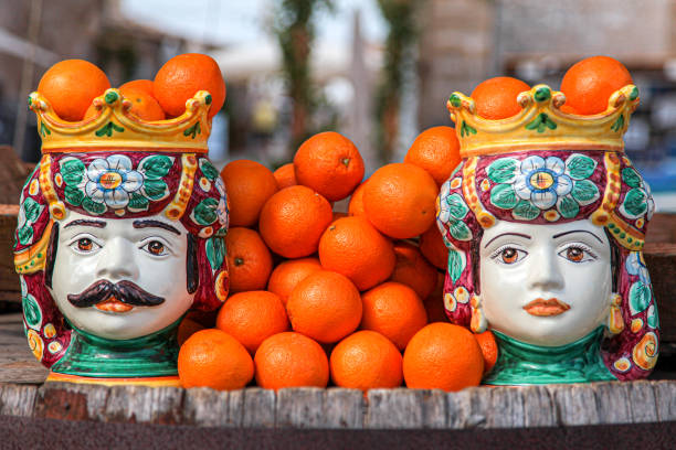 traditional Sicilian ceramic heads traditional Sicilian ceramic heads with oranges sicily stock pictures, royalty-free photos & images