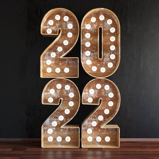 istock 2022 Bulb Sign Against Black Wall 1340462162