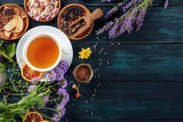 istock Herbal tea, top shot with copy space. Herbs, flowers and fruit 1340468320