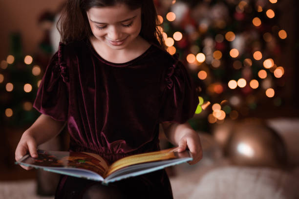 istock Happy girl reading 1340480195