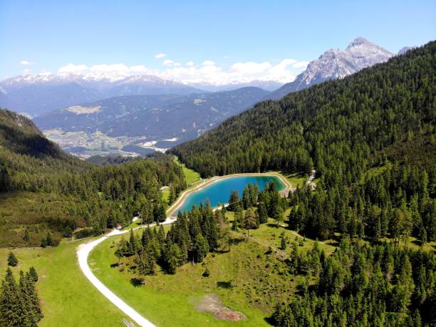 Alpine scenery Lake and mountain view in Austria neustift im stubaital stock pictures, royalty-free photos & images