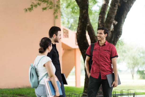 istock Latin university friends talking outside 1340480457
