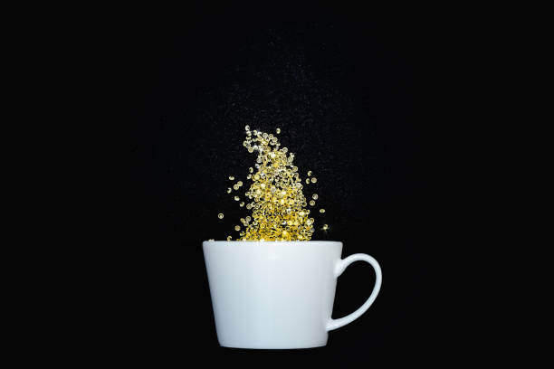 istock Blank white ceramic mug with yellow crystals and glitter 1340482095