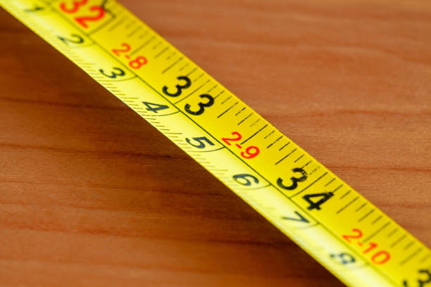 istock Measuring tape old, macro close-up, selective focus 1340483968