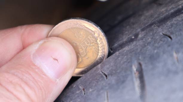 istock Car tire groove depth 1340488460