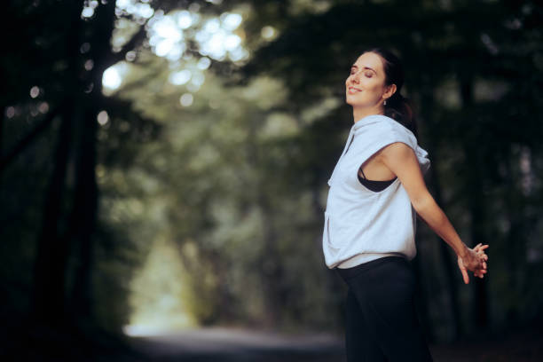 istock Sporty Woman Stretching Her Arms Before Jogging 1340493214