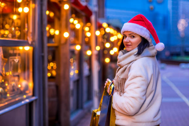 istock A Beautiful brunette Women at Winter Shopping 1340499996