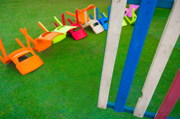 istock Upside down chairs for children. Playground 1340500579