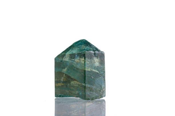 istock macro mineral stone Apatite on a white background 1340500789
