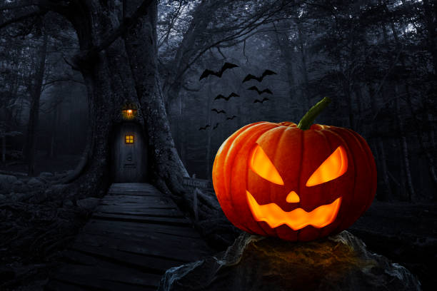 istock Halloween pumpkin in the forest 1340502876