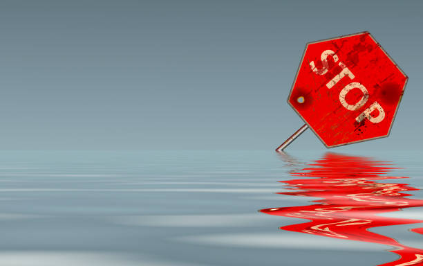 istock climate change symbol, red stop sign with water surface, inundation, flooding,global warming concept, illustration, grungy style 1340505733