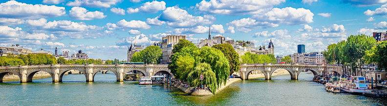 Panorama of the bridges of Paris France and the River Seine on a sunny day