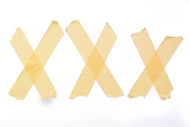 istock Three X made of adhesive tape 1340509877